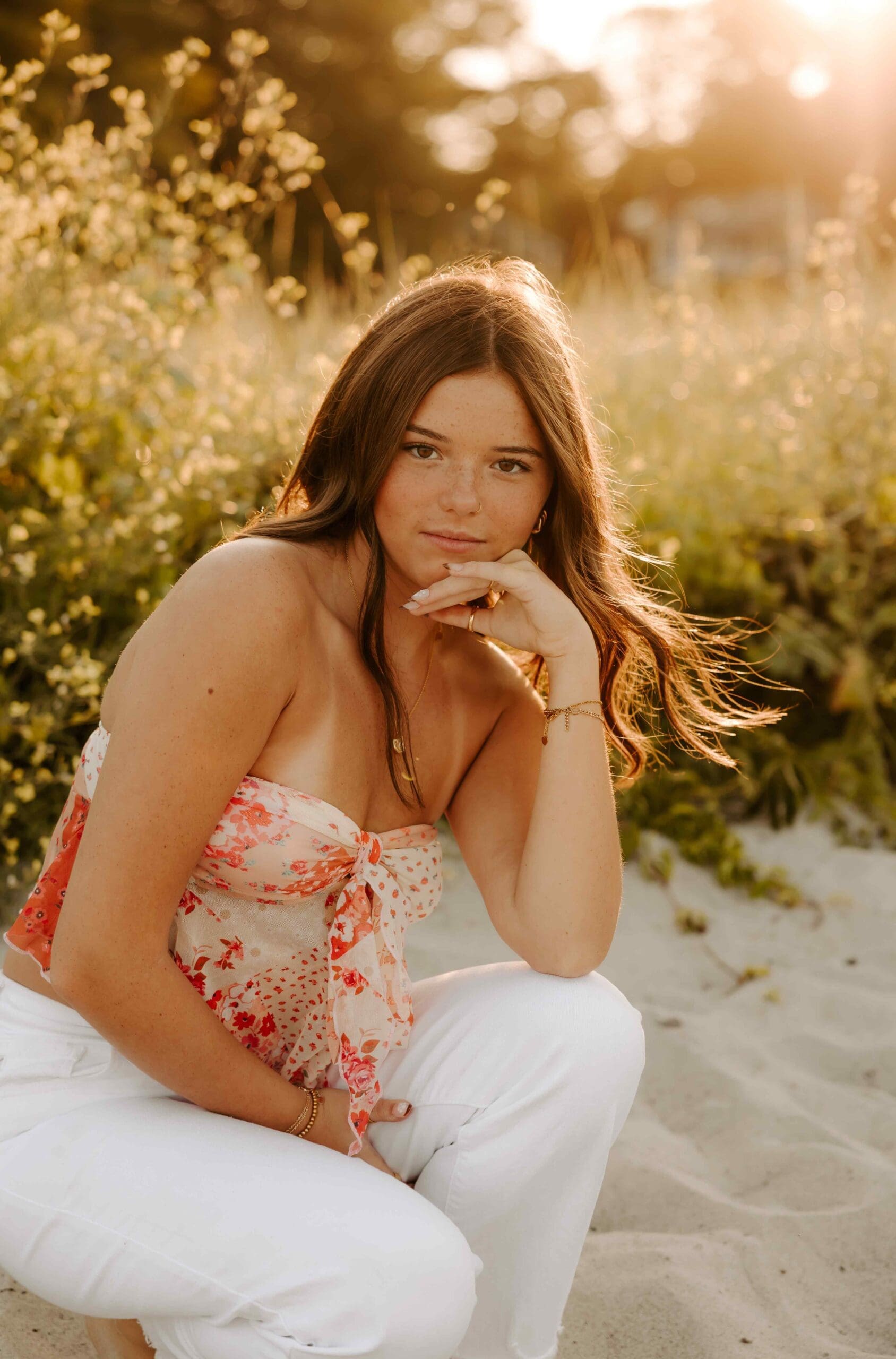 girl senior photo on the beach